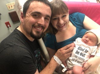 Mindy and Brice with newborn JJ